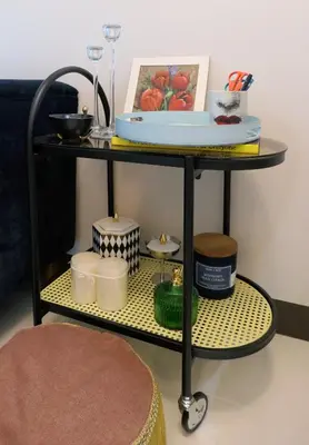 a shelf with candles and other items on it at Uptown BGC Taguig - One Bedroom in Manila
