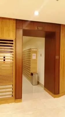 a hallway of a building with a refrigerator in it at The SPLENDOR Comfortable living by Awsom Phil in Manila