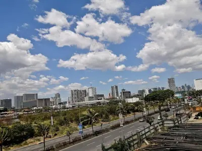 a view of a city from a highway at The SPLENDOR Comfortable living by Awsom Phil in Manila