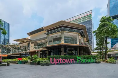 a building with a sign in front of it at Amazing Unit and View in Uptown Parksuites BGC in Manila