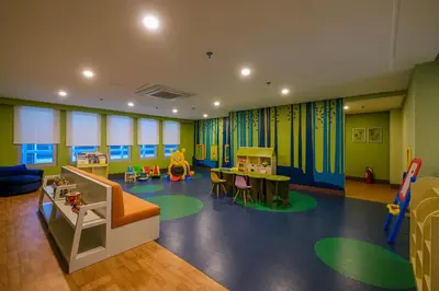 a childrens play room with colorful walls at Amazing Unit and View in Uptown Parksuites BGC in Manila