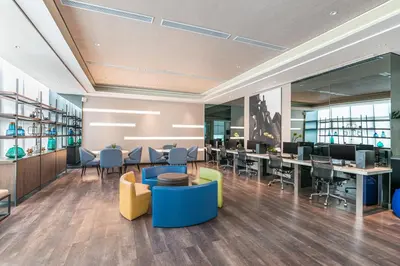 an office with desks and chairs and tables at Seda Nuvali Laguna near Tagaytay in Santa Rosa