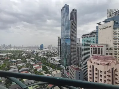 a view of a city with tall buildings at passion makati in Manila