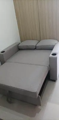 a bed sitting in a room with at Shore 2 Tower 1 JMB Staycation in Manila