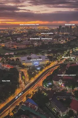 an aerial view of a city at night at Condo near UP-PGH, St. Lukes Medical Center and U.S Embassy in Ermita Manila in Manila