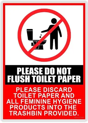 a sign that reads please do not flush toilet paper at Sea Residences 5mins walk to SM MoA, Arena, SMX, 55