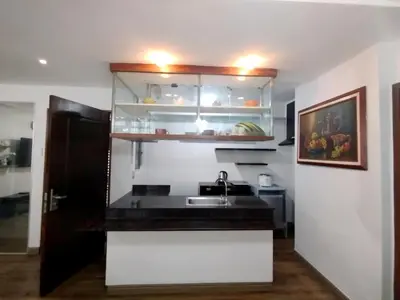 a kitchen with a sink and a counter top at SULIT CONDO Unit 2 Santa Mesa Manila in Manila