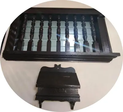 a black typewriter and a stack of books at SULIT CONDO Unit 2 Santa Mesa Manila in Manila