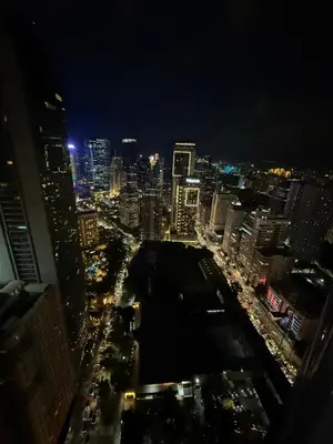 a view of a city skyline at night at Studio penthouse 1 in Manila
