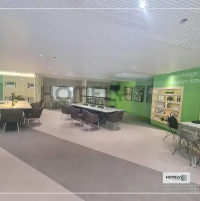 a large room with a ping pong table and chairs at Homely - SMDC Green 2 Residences, Dasmarinas City in Pasong Bayog