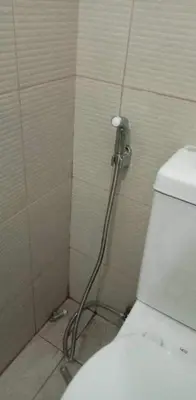 a shower in a bathroom with a toilet at AMAZING VIEWS ACROSS SHANGRILA MALL and NEAR MEGAMALL GREENFIELD DISTRICT in Manila