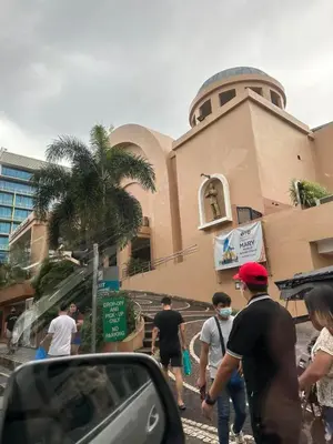 a group of people walking in front of a building at NAIA Terminal 3 Insane Interior, Be the Boss in Manila