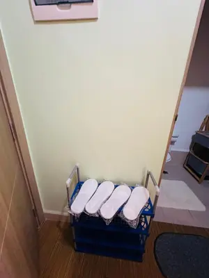 a group of three towels sitting on a shelf in a room at 5th One Bedroom Condo in Grace Residences Taguig in Manila