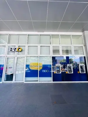 a building with a bdo sign on the side of it at 5th One Bedroom Condo in Grace Residences Taguig in Manila