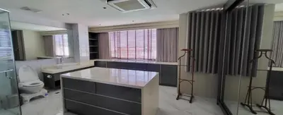 a bathroom with a sink and a toilet in it at Poblacion Penthouse Suite with Private Roofdeck in Manila