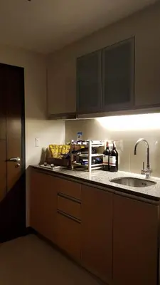a kitchen with a sink and a counter top at 101 Newport blvd C2 4F by Rechelle Nunag in Manila