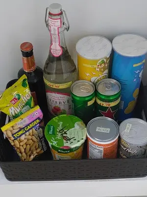 a basket filled with different types of food and drinks at Overnight @ Shakhbot's in Manila