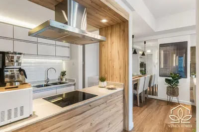 a kitchen with a sink and a counter top at Vibrant Oasis with the best view + Fast WiFi in Manila