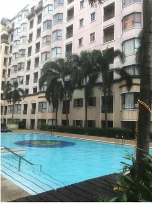 a large swimming pool in front of a large building at 1BR Condo at Montecito Newport City Residential Resort across NAIA and Marriott Hotel in Manila