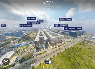 an overhead view of a building with many signs at Mall of Asia Shore 2 Condo in Manila