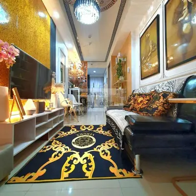 a living room with a bed and a rug at Kuro's Krib One Bedroom Condo Unit with Balcony at S Residences Pasay City MOA in Manila