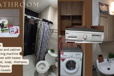 a bathroom with a toilet a sink and a washing machine at 2-BR COZY condo 200mbpsFiberWiFi/Netflix/pool/WFH in Manila
