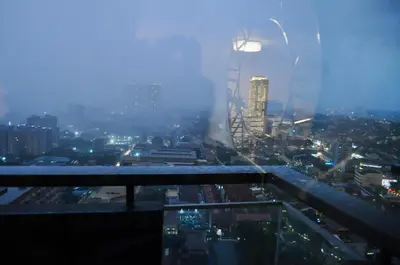 a view of a city at night at Casa De Camelina in Manila