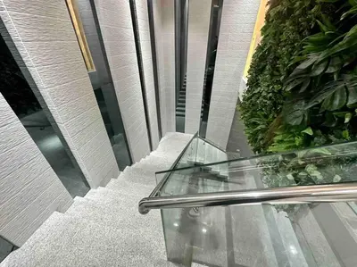 a glass table sitting on the side of a building at The DRYM Space — Curated Staycation in Mandaluyong in Manila