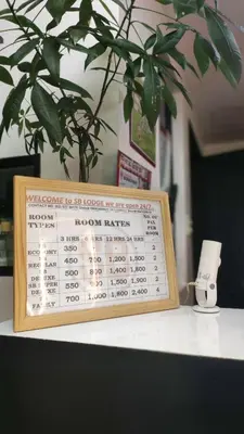 a wooden calendar sitting on top of a table at SB LODGE TAGUIG in Manila