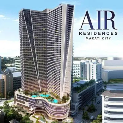 a magazine cover with a tall building in a city at Royal Victorian Studio in Makati in Manila