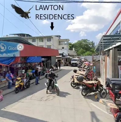a group of motorcycles parked on a city street at Lawton Residences Studio Room 3I in Manila