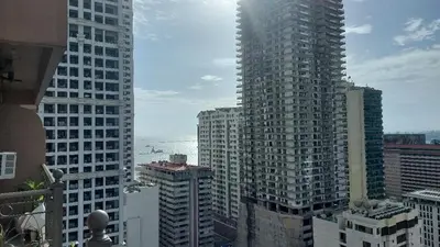 a view of a city skyline with tall buildings at Hospital ng Manila front delux le mirage de malate in Manila