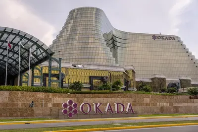 a building with the olympia sign in front of it at Shell Residences, Pasay near NAIA MOA SMX PICC in Manila