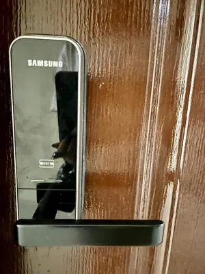 a close up of a mirror on a door at Stanford Suites 3 in Silang