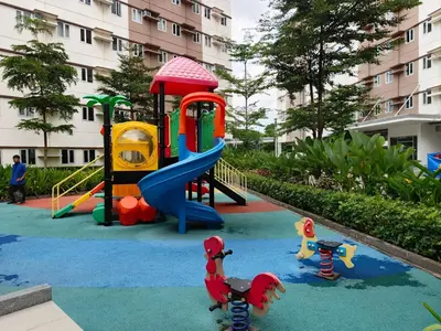 a playground with a slide and play equipment at Happy Stays B - 300mbps - 65