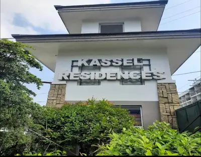 a sign on the side of a building at Condo Premium Near NAIA T123 in Manila