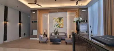 a lobby with a waiting room with chairs and a table at 2BR Irish Luck Holiday Apartment in Manila