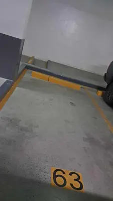 a wing of an airplane with the number on the ground at 2BR Irish Luck Holiday Apartment in Manila