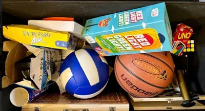 a box filled with balls and a box of snacks at H&H at Grace Residences in Manila