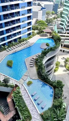 an overhead view of a building with two pools at Fresh Air in Heart of Makati in Manila