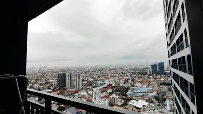 a view of a city from a building at Smart Cozy Home Air Residences Makati in Manila