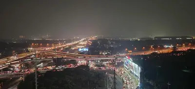 a view of a busy city at night at Casa Antonio at Fairway Terraces Family Penthouse 2BR Wi-Fi Nr Golf, Airport, Fort BGC in Manila
