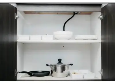 a pot on top of a stove in a kitchen at 2 Bed 2 Bath condo in Air Residences in Manila