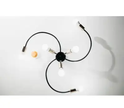 a black and white lamp on a white wall at 2 Bed 2 Bath condo in Air Residences in Manila