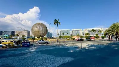 a city street with a lot of cars and a building at ART's Nest at Shore Residences in Manila
