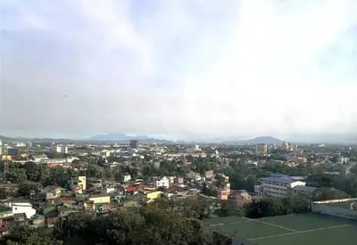 a view of a city with a tennis court at Casa REYNA at KASARA Urban Residences in Manila