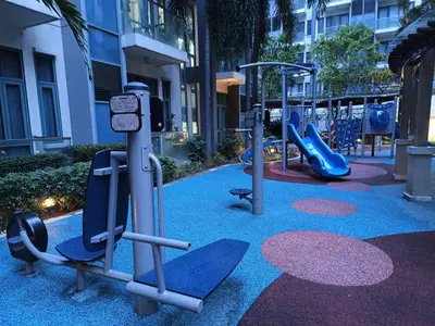 a playground with a slide and a play equipment at Near Terminal 3 Two Palmtree Villas- Walking distance only (JJRMK) in Manila