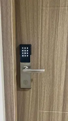 a door with a lock on a wooden door at Condo Suite/Apartment Pasay SM MOA - Stay Cozy & Boujee in Manila