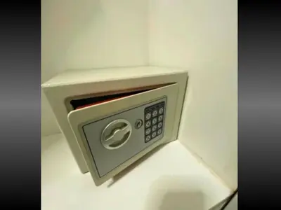 a microwave oven is attached to a wall at Family Room Staycation In The Heart Of Manila, with 2 Balcony Plus 40 Percent Promo Discount Plus Free Pool Access, Plus Free Sauna Promo in Manila Bay, Robinsons Place, Ermita, Pgh, Bellagio, UP Pedrogil, Staycation Updated 2025 Price in Manila