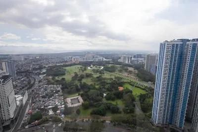 an aerial view of a park in the middle of a city at NEW 2BR of 86sqm with Parking & Netflix in BGC in Manila